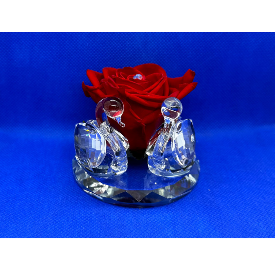 Cigni cristallo su base e rosa